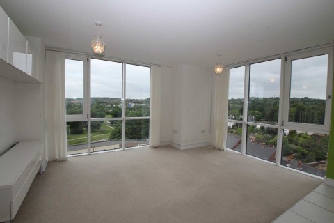 MODERN CORNER APARTMENT WITHIN ICONIC KD TOWER WITH PARKING FOR 1 CAR